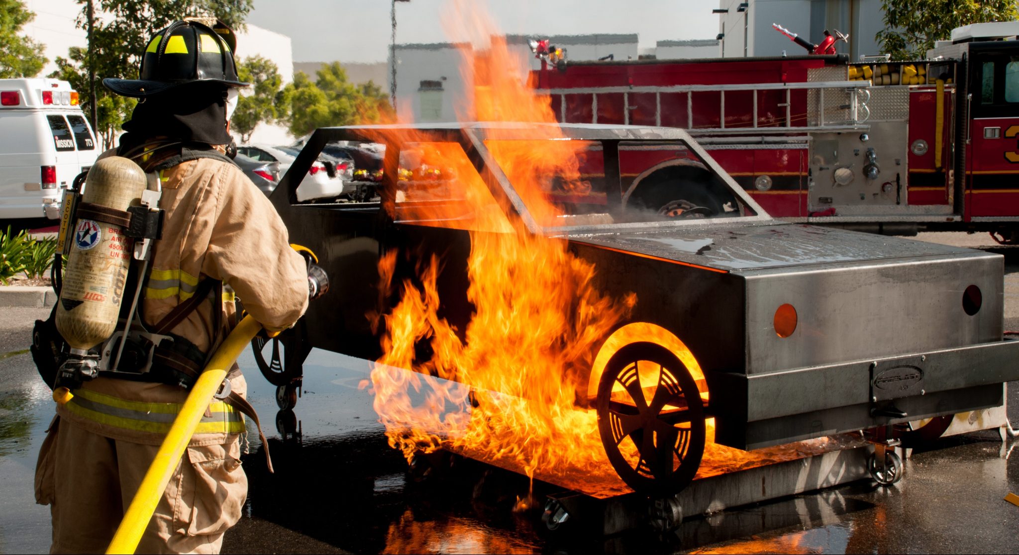 Controlled car fire training scenario for firefighter attack and suppression practice