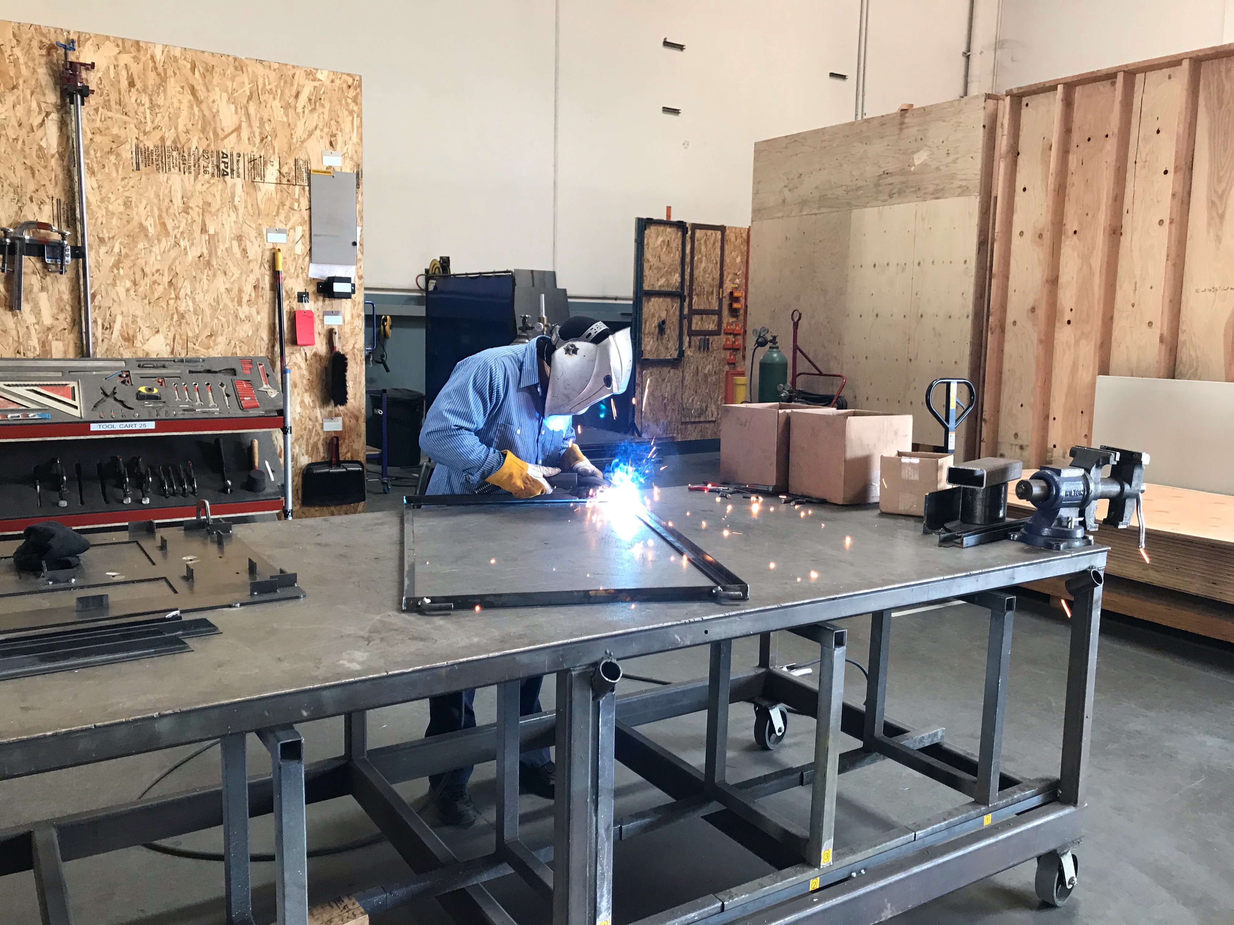 A man working on metal fabrication