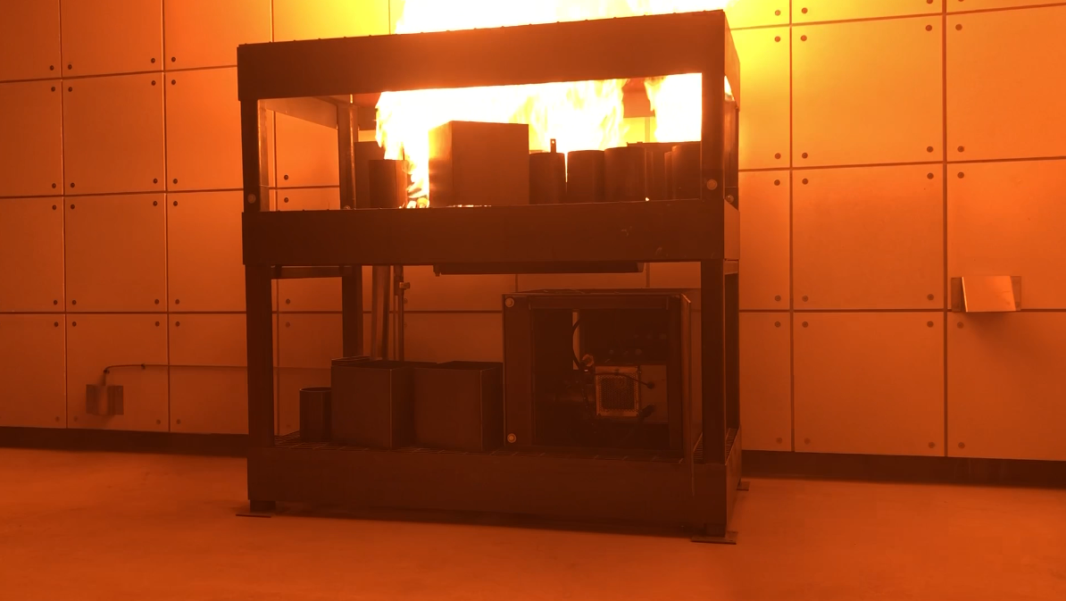 Interior gas-fired live-fire firefighter training prop