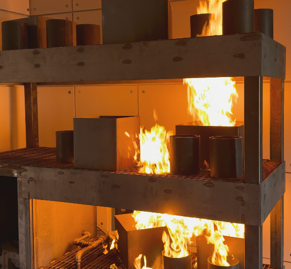 Interior gas-fired live-fire firefighter training prop