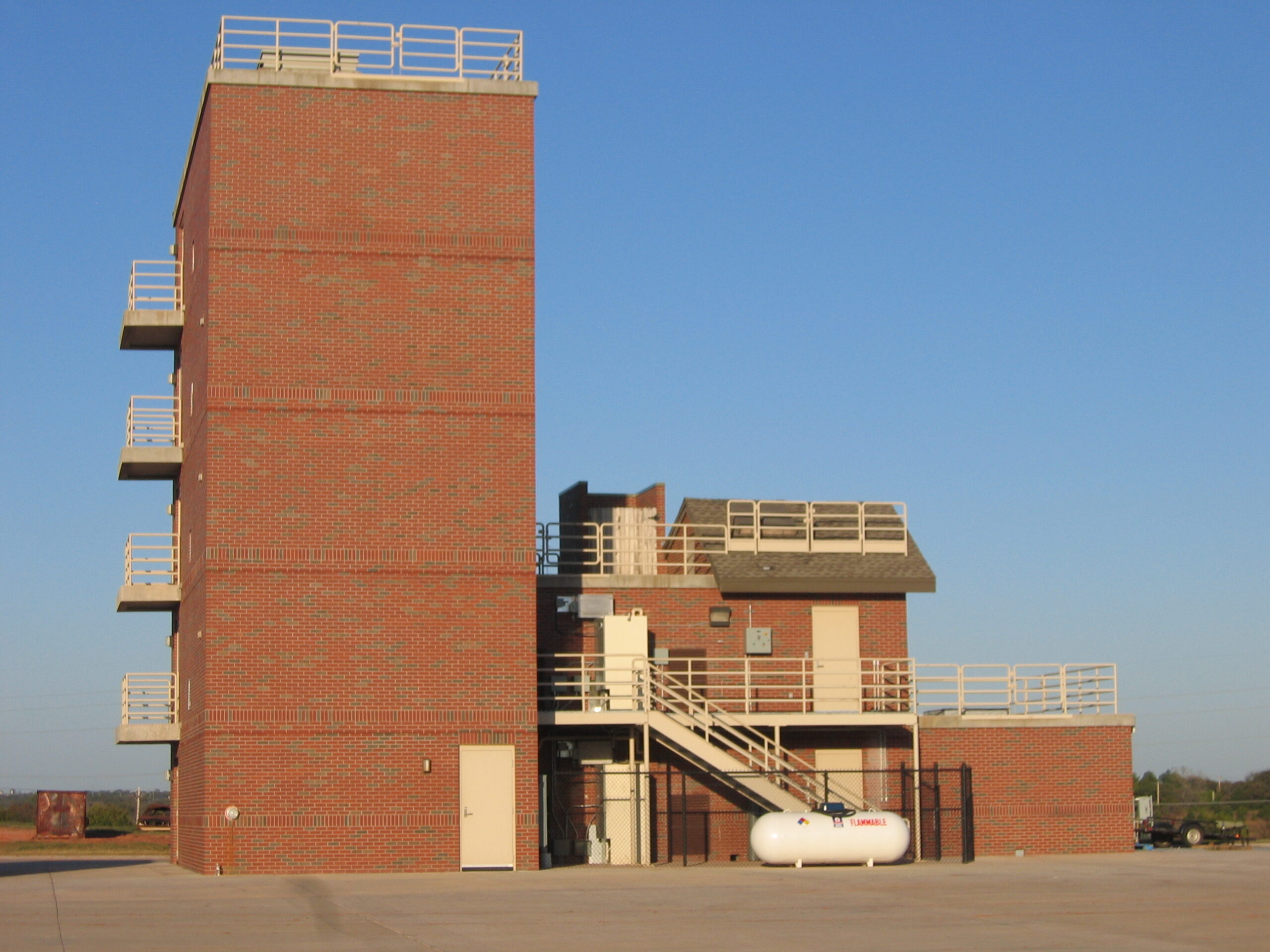 Burn tower configured for firefighter live-fire training exercises